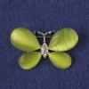Vlinderbroche olijfgroene kattenoog, witte strass-steentjes, zilverkleurig metaal 25×38 mm+