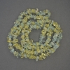 Kralenassortiment: Getint kristalchips op vislijn, diameter 6–10×2–4 mm, lengte 80 cm+