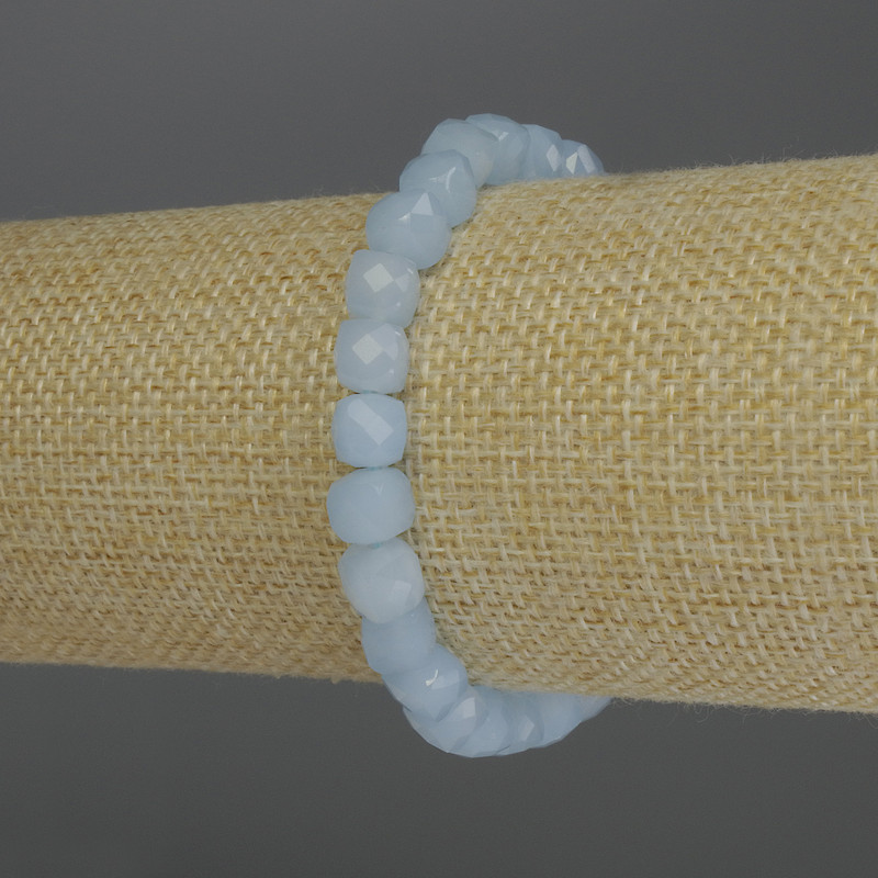 Armband aquamarijn facetgeslepen kubus, diameter ±7 mm, lengte 18 cm, elastische band