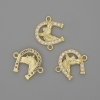 Paardenhoefvormige koppeling met witte strass-steentjes en goudkleurig metaal 14×17 mm+