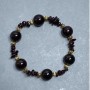 Armband Granaat, gladde kraal, diameter 12 mm ±, stukjes 7×2 mm ±, lengte 18 cm stretch