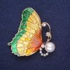Uitverkoop! Vlinderbroche met witte strass-steentjes, groene emaille en goudkleurig metaal 49×45 mm