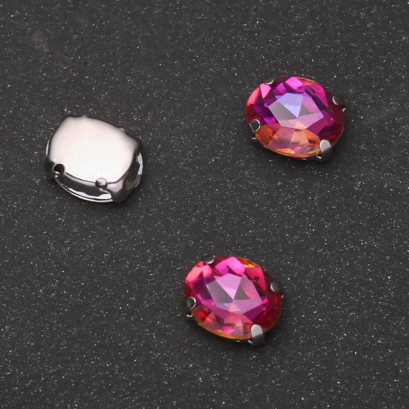 Prijs per verpakking /10 stuks. Naai-kristal met pin ovaal 8×10 mm frambozen-oranje
