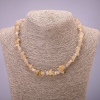 Kralenketting van natuurlijk rutielkwarts haarachtige korrel, diameter 7 mm (±), lengte 45-50 cm met verlengingsketting