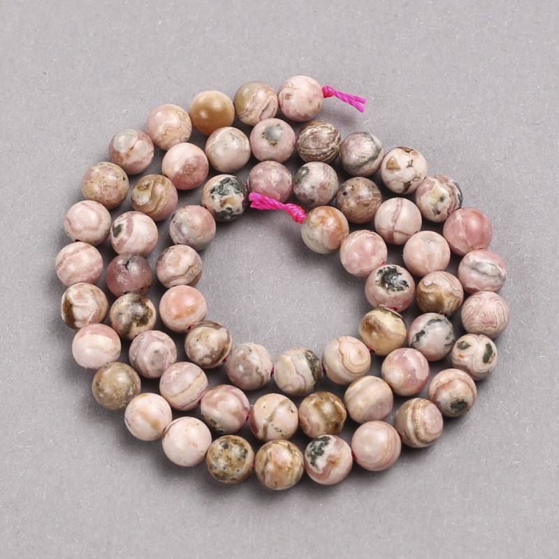 Kralen op draad van natuurlijk gesteente Rhodochrosiet, gladde bol, diameter 6,5 mm +-, lengte 38 cm +