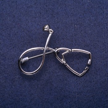 Broche 'Stethoscoop' grijs metaal 44×30 mm